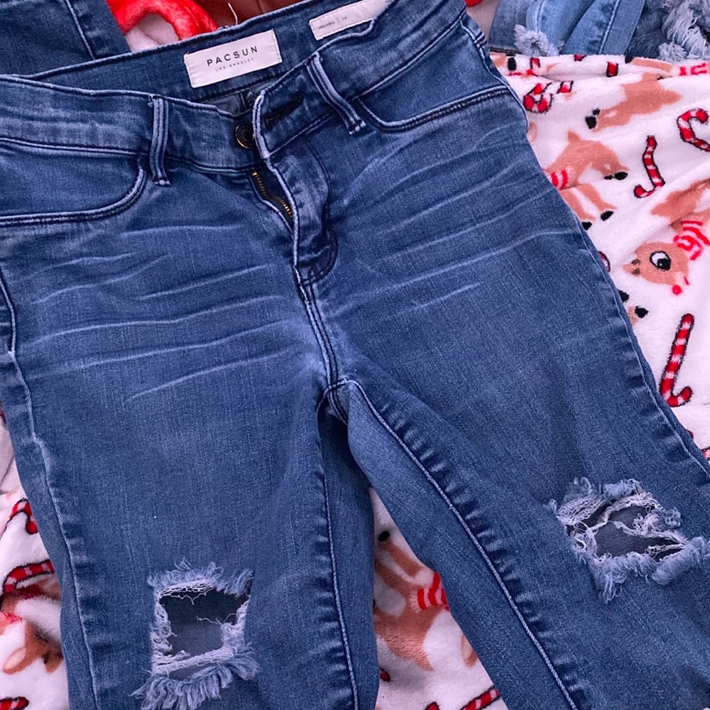 blue ripped jeans